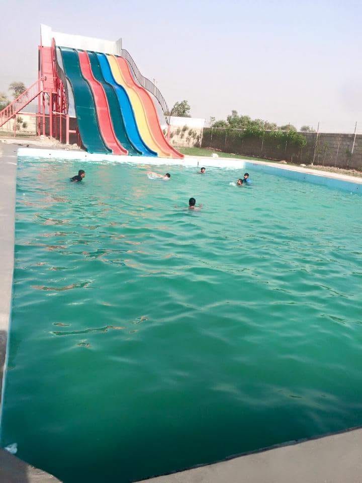 Water Slides and Swimming Pool at Shazaib Water Park, Sahiwal, Pakistan